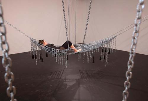 Monica Bonvicini, Chain Leather Swing, 2009. Chains (galvanized steel), chain snap closings (galvanized steel), 20 leather tassels